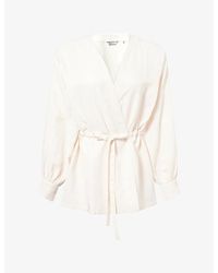 Kayanee - City Wrap-Front Linen-Blend Top - Lyst