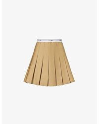 HOMMEGIRLS - Branded Waistband Mid-rise Cotton-twill Mini Skirt - Lyst