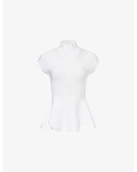 KHAITE - Andra Stand-Collar Knit Top - Lyst