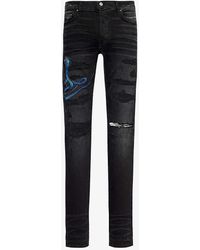 Amiri - Snake-patch Slim-fit Tapered Stretch-denim Jeans - Lyst