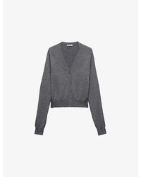 Prada - Triangle-Appliqué V-Neck Wool Knitted Cardigan - Lyst