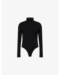 Alaïa - Noir Heart Cut-Out Jersey Bodysuit - Lyst