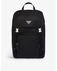 Prada - Re-nylon Brand-plaque Recycled-polyamide And Saffiano Leather Backpack - Lyst