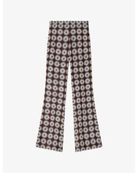 Sandro - Floral-Print Flared Woven Trousers - Lyst