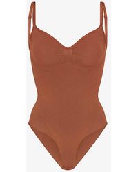 Skims - Seamless Sculpt Fitted Stretch-woven Body - Lyst