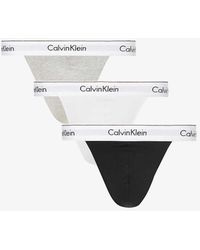 Calvin Klein - Branded-waistband Mid-rise Pack Of Three Stretch-cotton Thong - Lyst