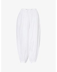 Alaïa - Cropped-leg High-rise Cotton-poplin Trousers - Lyst