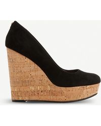 dune black wedge trainers