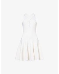 Alaïa - Cross-Front Knit Mini Dress - Lyst