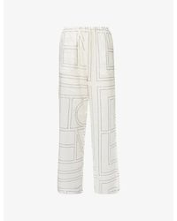 TOTEME - Monogram-Print Wide-Leg Cotton-Blend Pajama Bottoms - Lyst