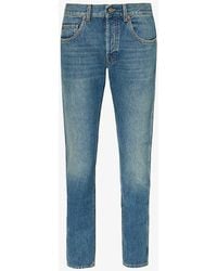 Gucci - Brand-patch Faded-wash Mid-rise Tapered-leg Jeans - Lyst