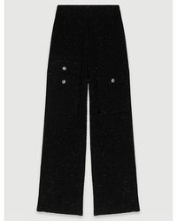 Maje - High-rise Flared-leg Tweed Cotton-blend Trousers - Lyst