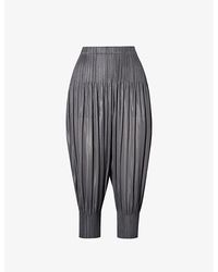 Pleats Please Issey Miyake - Pleated Tapered-leg Mid-rise Knitted Trousers - Lyst
