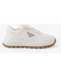 Prada - Brand-plaque Leather Low-top Trainers - Lyst
