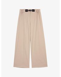 Maje - Buckle-Embellished Logo-Embroidered Stretch-Cotton Trousers - Lyst