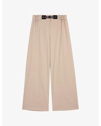 Maje - Buckle-Embellished Logo-Embroidered Stretch-Cotton Trousers - Lyst