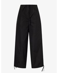 TOTEME - Drawstring Cotton Trousers - Lyst