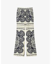 Sandro - Graphic-print Wide-leg Mid-rise Satin Trousers - Lyst