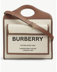 Burberry Hackberry Logo Printed Canvas Bag in Natural | Lyst