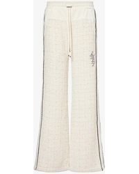 Amiri - Bouclé-panel Brand-embroidered Woven Trousers - Lyst