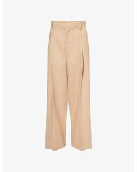 Victoria Beckham - Pleated Wide-Leg Wool-Blend Trousers - Lyst