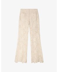 Sandro - Floral Flared Lace Trousers - Lyst