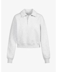 Skims - Logo Cotton-Fleece Polo Sweatshirt - Lyst