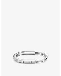 Tiffany & Co. - Lock 18Ct- And 0.31Ct Diamond Bangle Bracelet - Lyst