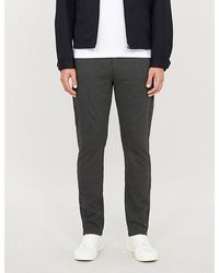 PAIGE - Stafford Slim-fit Tapered-leg Stretch-jersey Trousers - Lyst