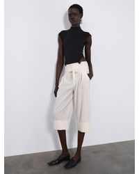 SÉLONE - Arin High-Neck Bodysuit - Lyst