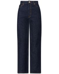 KHAITE - Button Embellished Straight-Leg Jeans - Lyst