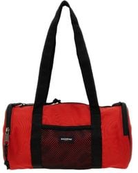 Eastpak - X Telfar Medium Duffle Logo Patch Shoulder Bag - Lyst