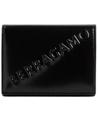 Ferragamo - Ferragamo Logo Embossed Bi-Fold Wallet - Lyst