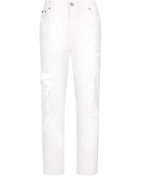 Dolce & Gabbana - Logo Plaque Distressed Jeans - Lyst
