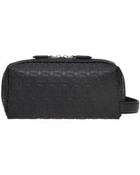 Ferragamo - Embossed-Logo Travel Pouch - Lyst