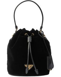 Prada - Logo Plaque Drawstring Mini Top Handle Bag - Lyst