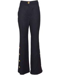 Patou - Button-Detailed Tweed Flared Trousers - Lyst