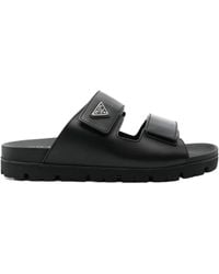 Prada - Enamel-Triangle Slip-On Sandals - Lyst