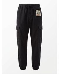 Gucci - Logo Patch Wide-Leg Cargo Trousers - Lyst