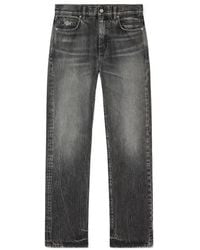 Versace - Logo-Patch Loose Jeans - Lyst