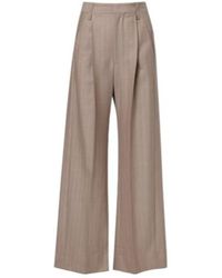 Victoria Beckham - Herringbone Virgin Wool Pleated Pants - Lyst