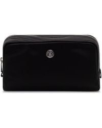 Tory Burch - Medium Twist Cosmetic Case - Lyst