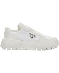 Prada - Triangle-Logo Round-Toe Lace-Up Sneakers - Lyst