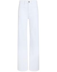 KHAITE - Logo Patch Wide-Leg Jeans - Lyst