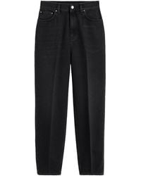 TOTEME - Faded-Effect Tapered-Leg Jeans - Lyst