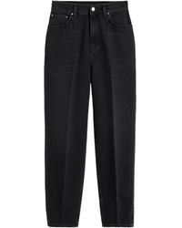 TOTEME - Faded-Effect Tapered-Leg Jeans - Lyst