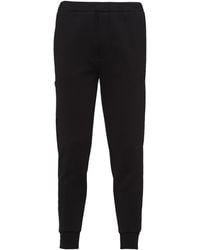 Prada - Cotton Fleece Joggers With Re-Nylon Details - Lyst
