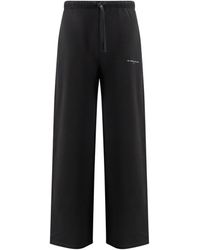 ih nom uh nit - Logo Printed Wide-Leg Trousers - Lyst