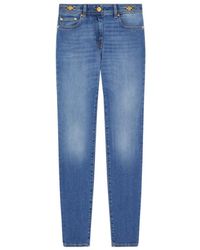 Versace - Tapered Leg Jeans - Lyst