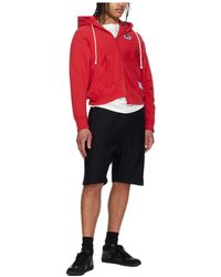 Undercover - X Champion Logo-Embossed Shorts - Lyst